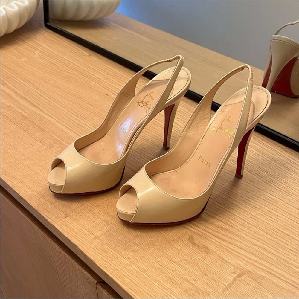 Two Christian Louboutin pair of shoes
